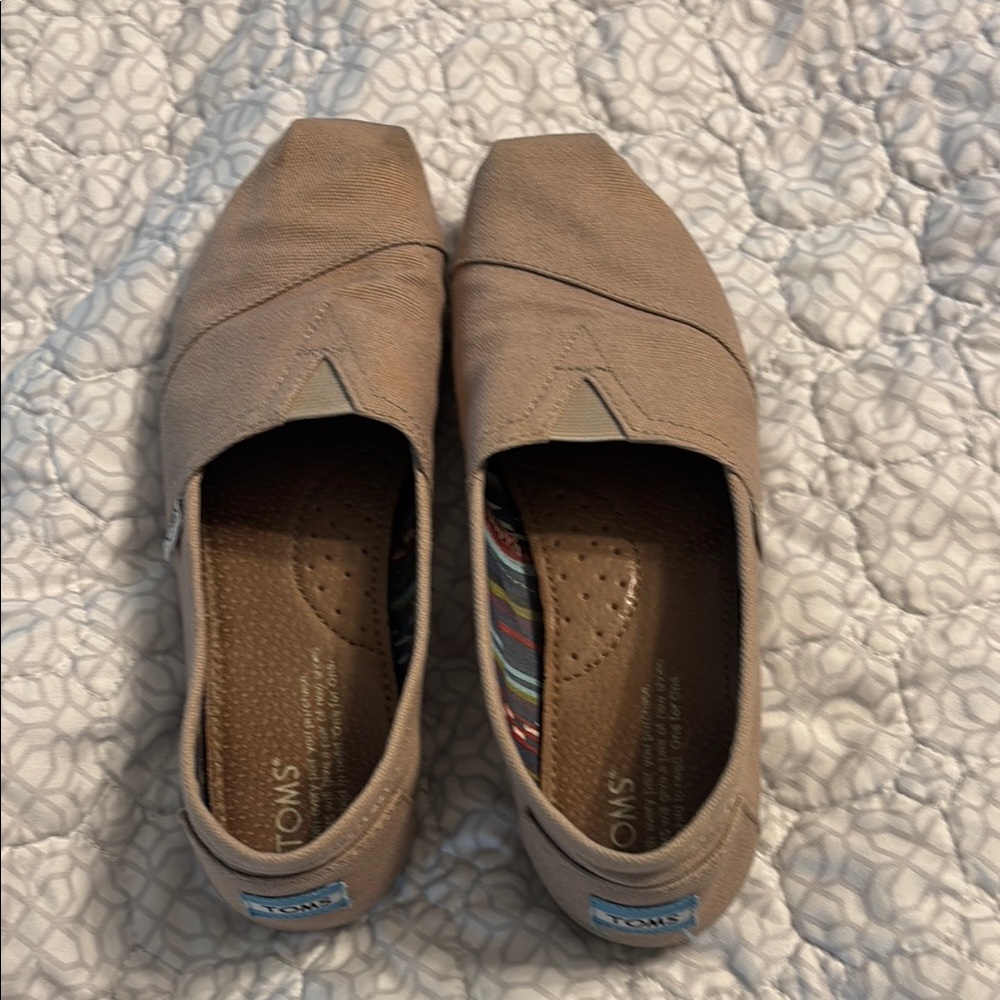 Toms Tan Flats with Classic Slip-On Design